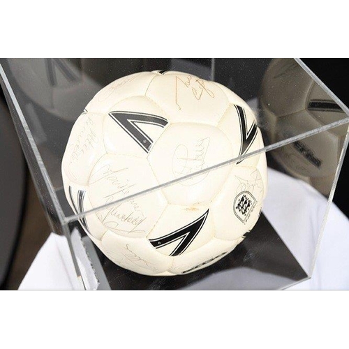 118 - A multi-signed football with original England Football Team signatures. Complete with Perspex case. ... 