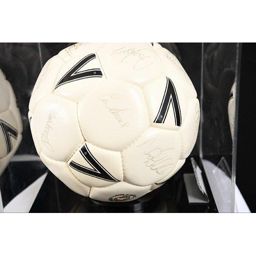 118 - A multi-signed football with original England Football Team signatures. Complete with Perspex case. ... 