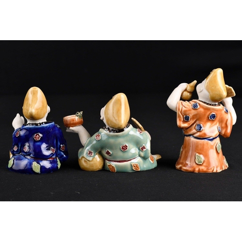 120 - This delightful little set of 3 Chinese porcelain figures are hand painted and glazed.. H: 14cm  W: ... 