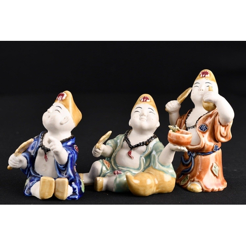 120 - This delightful little set of 3 Chinese porcelain figures are hand painted and glazed.. H: 14cm  W: ... 