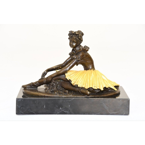 124 - A ballet dancer in solid bronze on a black marble base.. H: 15cm  W: 21cm  D: 11cm#124