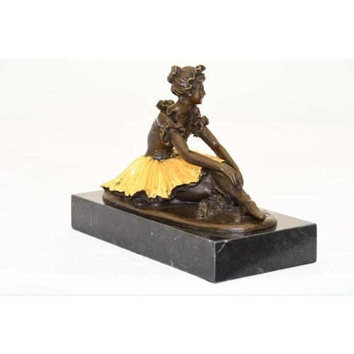 124 - A ballet dancer in solid bronze on a black marble base.. H: 15cm  W: 21cm  D: 11cm#124