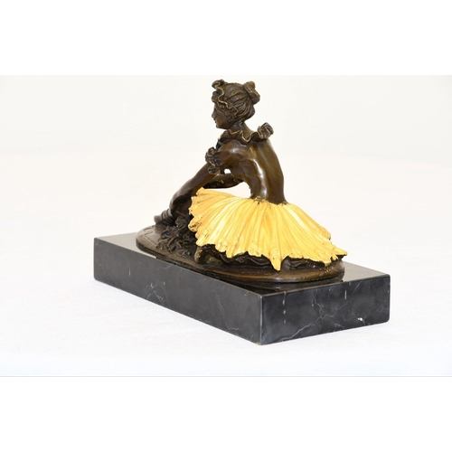 124 - A ballet dancer in solid bronze on a black marble base.. H: 15cm  W: 21cm  D: 11cm#124