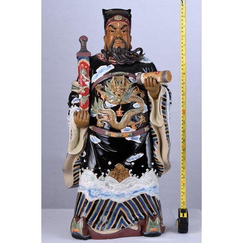 131 - An original Shiwan figure with intricate and colourful hand decoration Origin Foshan Guangdong Provi... 