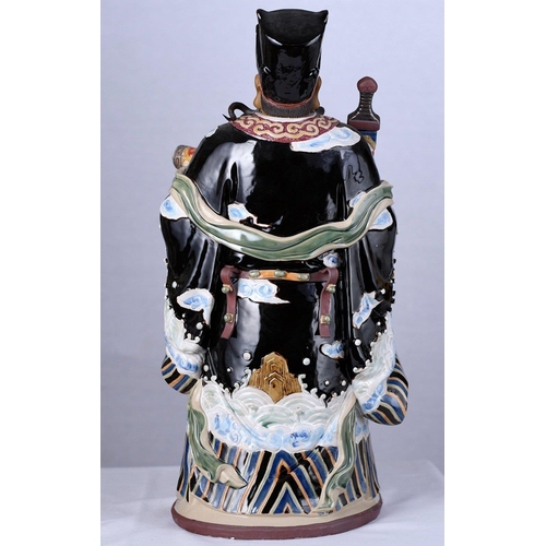 131 - An original Shiwan figure with intricate and colourful hand decoration Origin Foshan Guangdong Provi... 