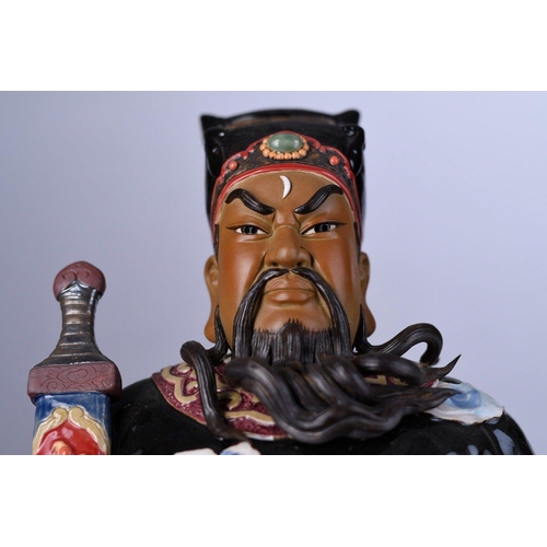 131 - An original Shiwan figure with intricate and colourful hand decoration Origin Foshan Guangdong Provi... 