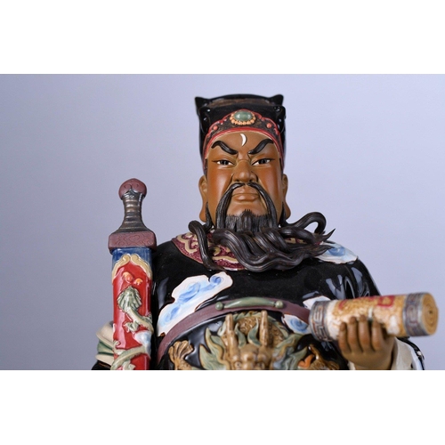 131 - An original Shiwan figure with intricate and colourful hand decoration Origin Foshan Guangdong Provi... 