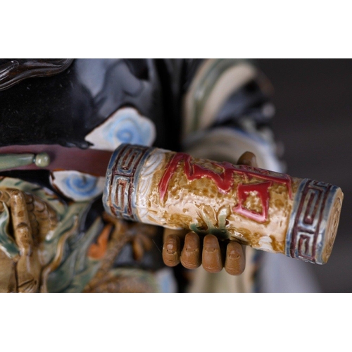 131 - An original Shiwan figure with intricate and colourful hand decoration Origin Foshan Guangdong Provi... 