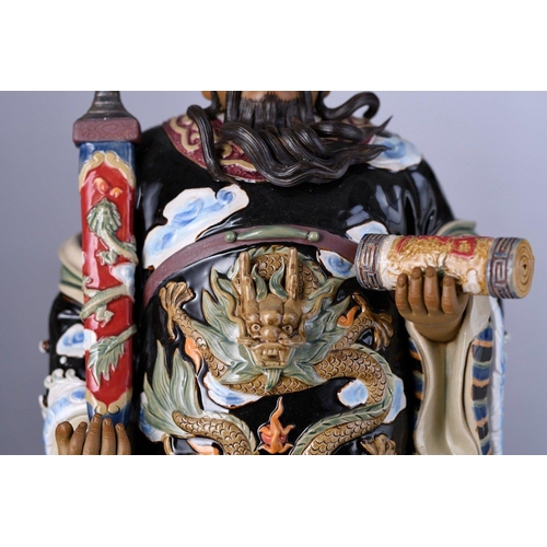 131 - An original Shiwan figure with intricate and colourful hand decoration Origin Foshan Guangdong Provi... 