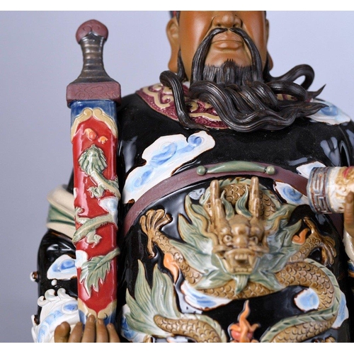 131 - An original Shiwan figure with intricate and colourful hand decoration Origin Foshan Guangdong Provi... 