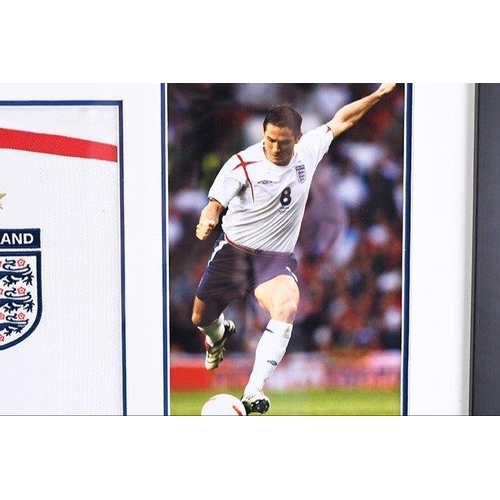 135 - A very nicely framed England shirt which has been personally signed by JOHN TERRY & FRANK LAMPAR... 