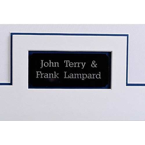 135 - A very nicely framed England shirt which has been personally signed by JOHN TERRY & FRANK LAMPAR... 