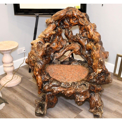 14 - A unique piece of furniture that has been hand made from old tree roots. It has been beautifully scu... 