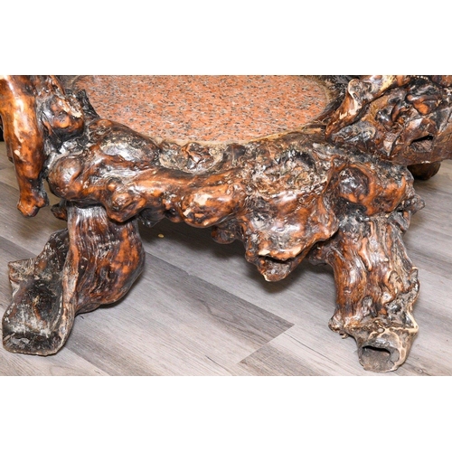 14 - A unique piece of furniture that has been hand made from old tree roots. It has been beautifully scu... 