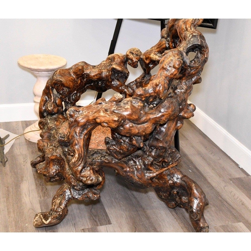 14 - A unique piece of furniture that has been hand made from old tree roots. It has been beautifully scu... 