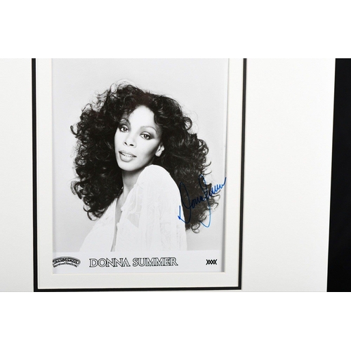 148 - A DONNA SUMMER unique signed photo presentation which has been professionally display mounted ready ... 