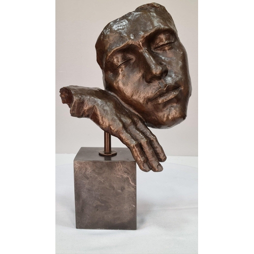 150 - A bronze sculpture of a face on solid marble base. H: 40cm  W: 27cm  D: 15cm#150