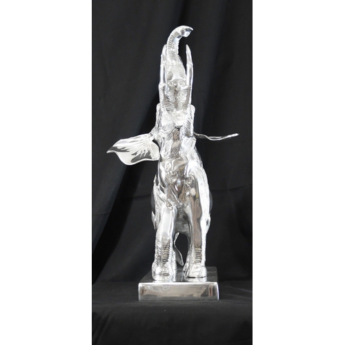 151 - A very large highly polished aluminium Elephant on base with super detail.. H: 68cm  W: 45cm  D: 40c... 