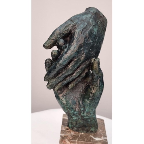 154 - Bronze casting of hands with a verdigris finish on solid marble base. H: 22cm  W: 9cm  D: 6cm#154... 