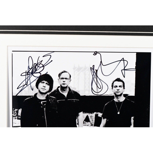 158 - Memorabilia presentation incorporating a photograph signed by DEPECHE MODE band members Dave Gahan, ... 