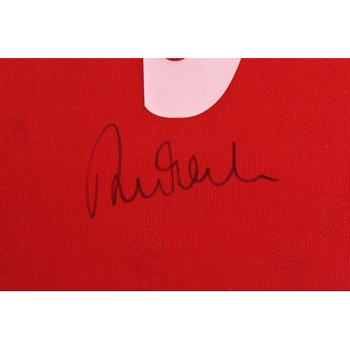 165 - A framed Liverpool shirt which has been personally signed by ROBBIE FOWLER. NOTE: this item will be ... 