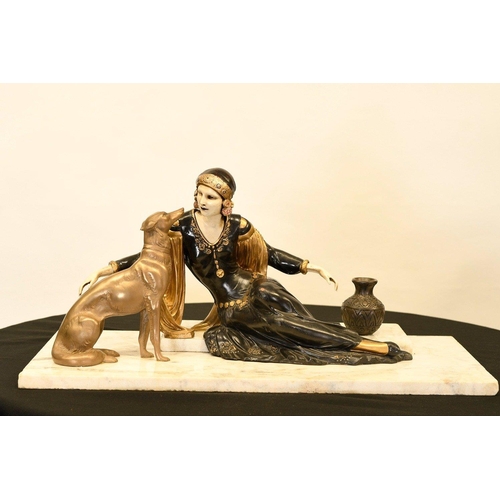 166 - This wonderful art deco style sculpture has been cast completely by hand. The lady with dog figure s... 