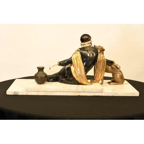 166 - This wonderful art deco style sculpture has been cast completely by hand. The lady with dog figure s... 