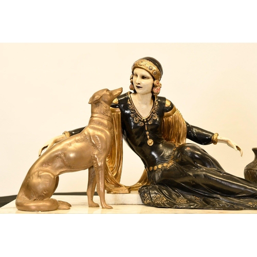 166 - This wonderful art deco style sculpture has been cast completely by hand. The lady with dog figure s... 