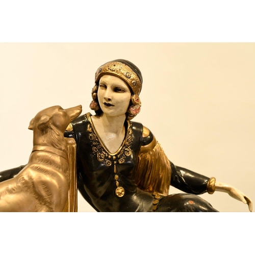 166 - This wonderful art deco style sculpture has been cast completely by hand. The lady with dog figure s... 