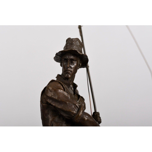 177 - A solid bronze detailed sculpture of a fisherman on a solid black marble base.. H: 46cm  W: 16cm  D:... 