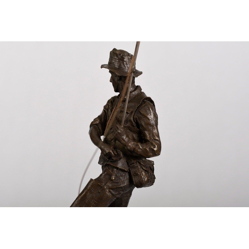 177 - A solid bronze detailed sculpture of a fisherman on a solid black marble base.. H: 46cm  W: 16cm  D:... 