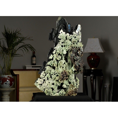 180 - An original high quality hand carved Chinese Jade Carving of a temple scene with intricate work thro... 