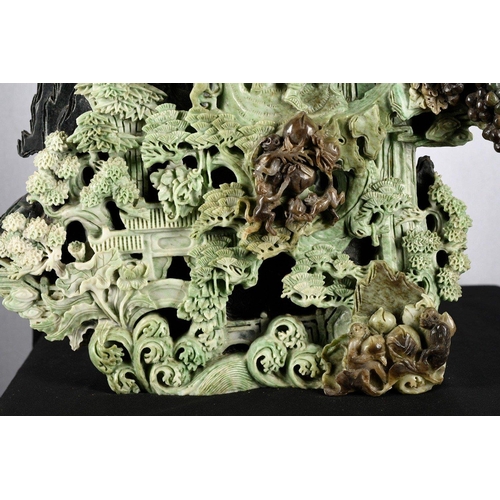 180 - An original high quality hand carved Chinese Jade Carving of a temple scene with intricate work thro... 