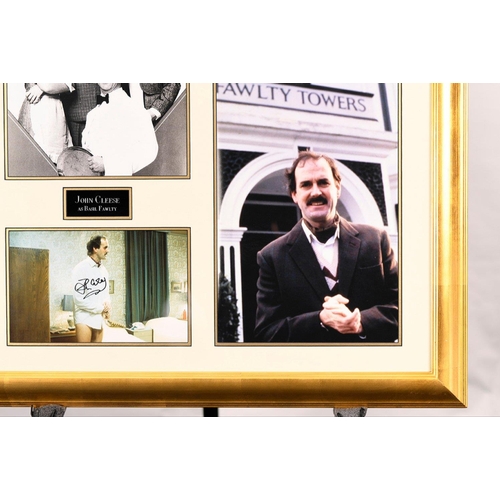 192 - An original framed memorabilia presentation of FAWLTY TOWERS incorporating a signed photograph beari... 