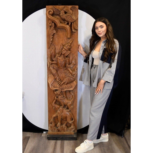 194 - An original hand carved large teak wood panel depicting a goddess with animals Origin Thailand Circa... 