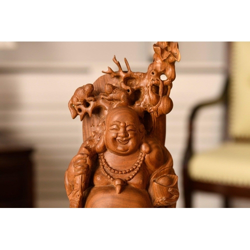 196 - A Buddha which has been wonderfully carved from once piece of sandalwood. Origin Zhejiang Province C... 