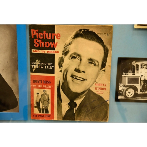 197 - A unique framed memorabilia presentation of NORMAN WISDOM. It has an original 