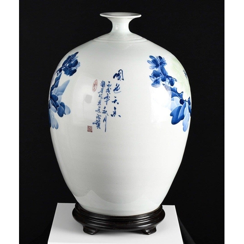 211 - A stunning hand made Chinese porcelain art vase which has embossed detail and has been fully hand pa... 