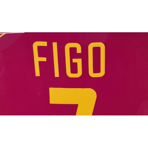 213 - A framed presentation of the Portuguese football legend LUIS FIGO's match worn shirt. Supplied with ... 