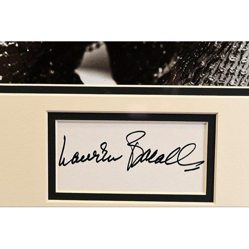 214 - A framed original signature of the Hollywood star LAUREN BACALL. NOTE: this item will be supplied wi... 