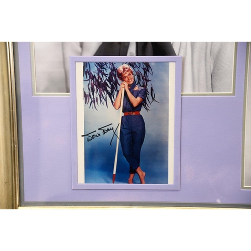 219 - A lovely piece of framed memorabilia for any fan or collector. It has a personally signed photo by D... 