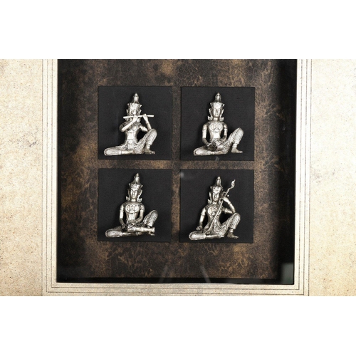 220 - A set of four box framed Buddhas each set on their own plinth. A few tiny marks on the frame. Origin... 