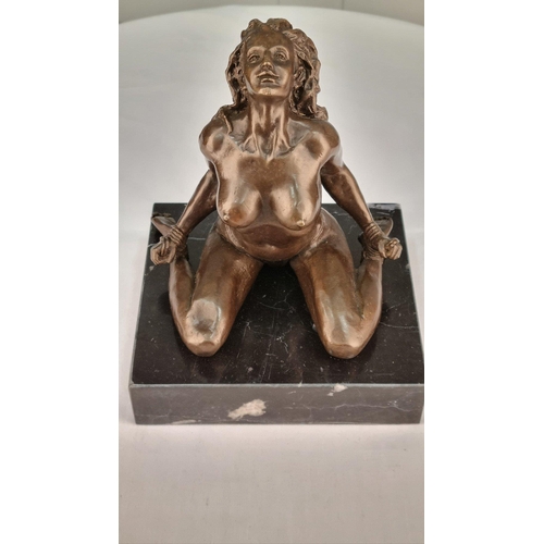 221 - A bronze casting of a Nude with well sculpted detail on solid black marble base. H: 22cm  W: 17cm  D... 