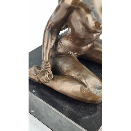 221 - A bronze casting of a Nude with well sculpted detail on solid black marble base. H: 22cm  W: 17cm  D... 