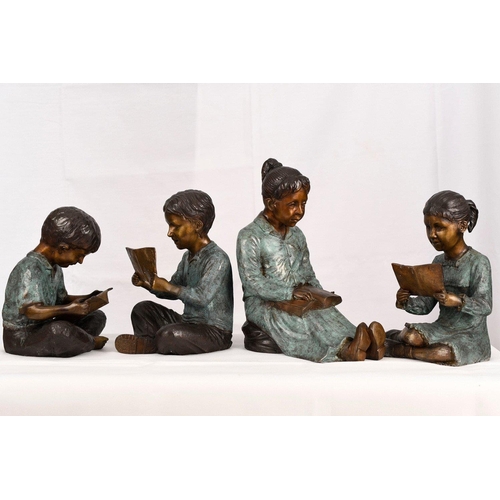 222 - A set of four hand cast bronze figures consisting of 3 children with their teacher. Lovely detail wi... 