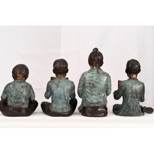 222 - A set of four hand cast bronze figures consisting of 3 children with their teacher. Lovely detail wi... 