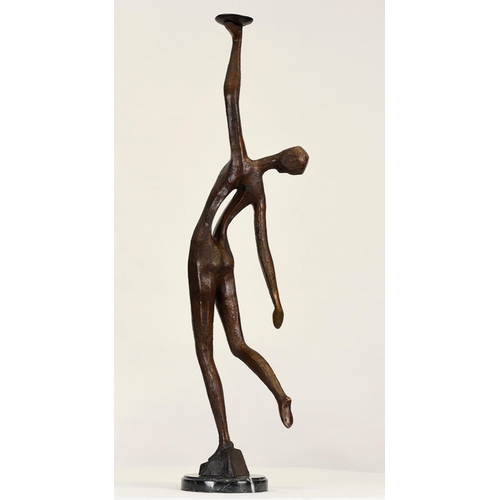 224 - This modern minimalist sculpture has been cast from bronze and sits on a black marble base.. H: 85cm... 