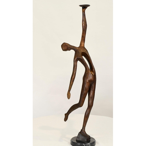 224 - This modern minimalist sculpture has been cast from bronze and sits on a black marble base.. H: 85cm... 