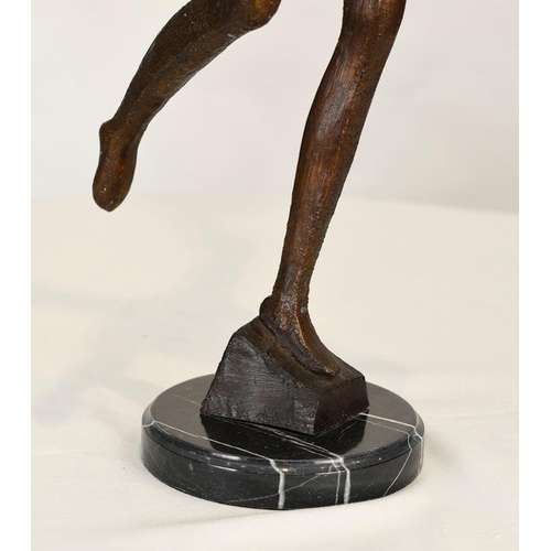 224 - This modern minimalist sculpture has been cast from bronze and sits on a black marble base.. H: 85cm... 