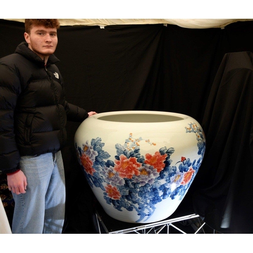 237 - This is a very substantial piece of hand made Chinese porcelain, measuring approximately three and a... 